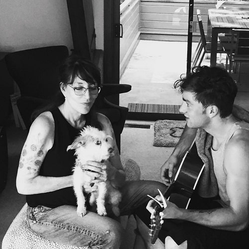A picture of Katey Sagal practicing singing with her elder son, Jackson James White.